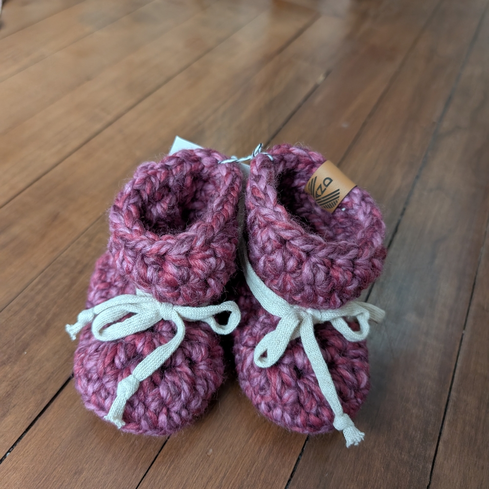 Cozy Pink Knitted Slippers with White Bows